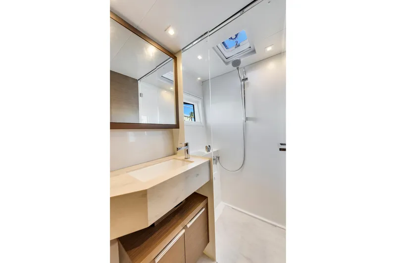 Slide: The Image of Modern bathroom interior of 2022 Lagoon 46 yacht with shower and vanity. - 32