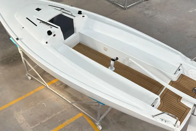 Slide: The Image of 2026 J Boats J/7 sailboat on shipyard floor, interior view. - 19