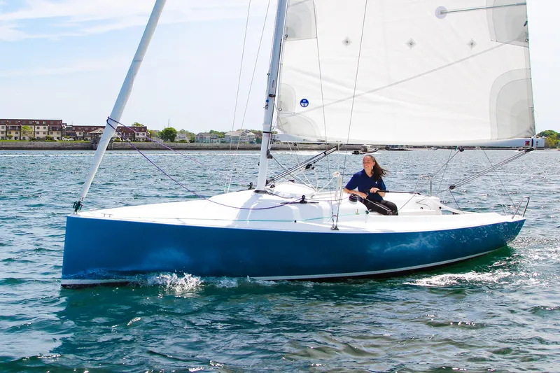 Slide: The Image of 2026 J Boats J/7 sailboat on water with sailor. - 8