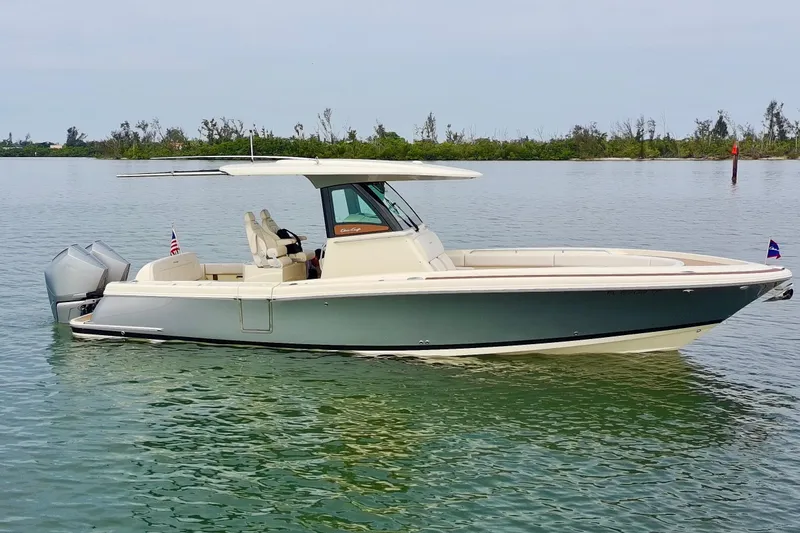 The Image of 2024 Chris-Craft Catalina 30 boat on calm water, side view. - 0