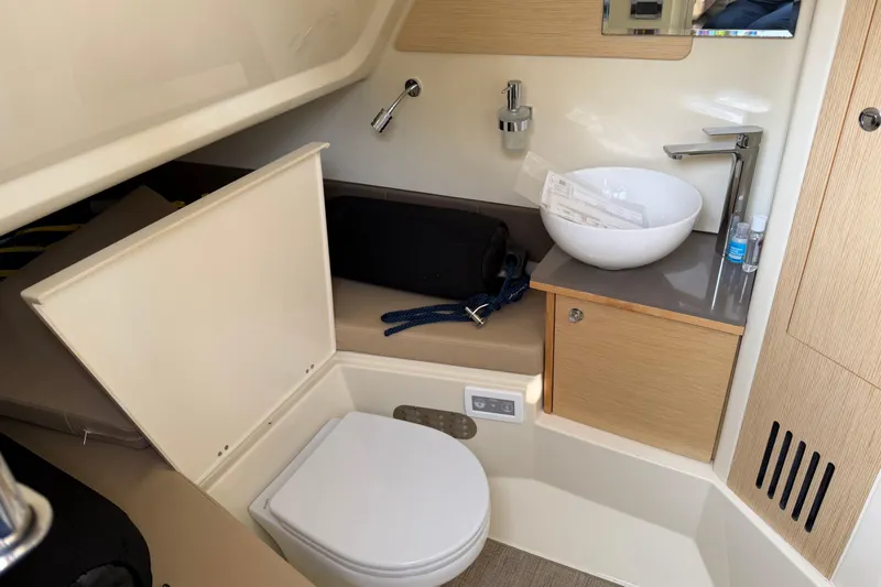 Slide: The Image of 2024 Chris-Craft Catalina 30 bathroom with modern fixtures and compact design. - 16