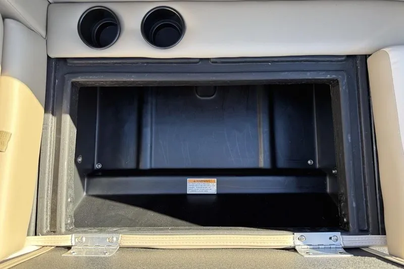 Slide: The Image of Open storage compartment in 2026 Premier 220 Sunscape RF XLC boat interior. - 5