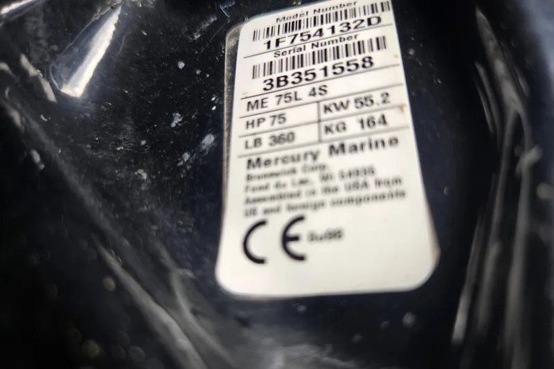 Slide: The Image of Label on Mercury Marine engine, showing model and serial numbers, specifications, and CE certification. - 26