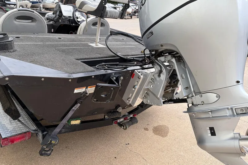 Slide: The Image of 2018 Polarcraft TX 195 boat with outboard motor, rear view on trailer. - 13