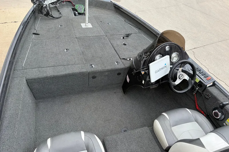 Slide: The Image of 2018 Polarcraft TX 195 boat interior with Garmin navigation system and dual seating. - 21
