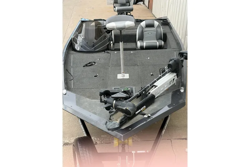 Slide: The Image of 2018 Polarcraft TX 195 fishing boat with Minn Kota trolling motor and dual seats. - 5