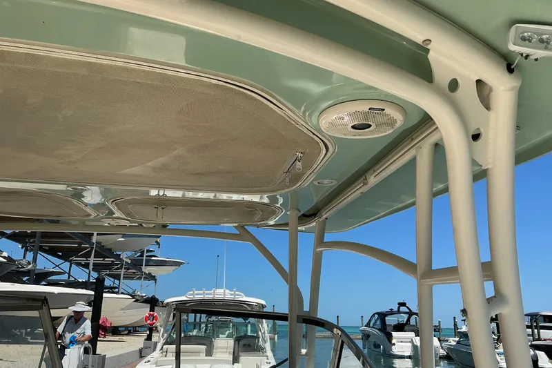 Slide: The Image of 2018 Grady-White Freedom 285 boat interior with canopy and speaker system. - 10