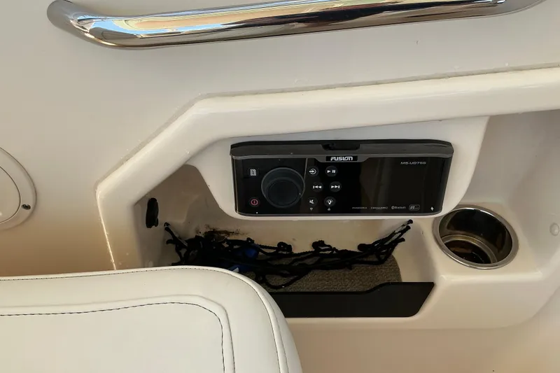 Slide: The Image of Fusion stereo system on 2018 Grady-White Freedom 285 boat dashboard. - 17