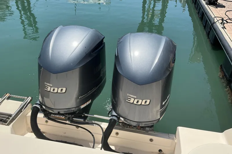 Slide: The Image of Twin Yamaha 300 outboard engines on a 2018 Grady-White Freedom 285 boat. - 23