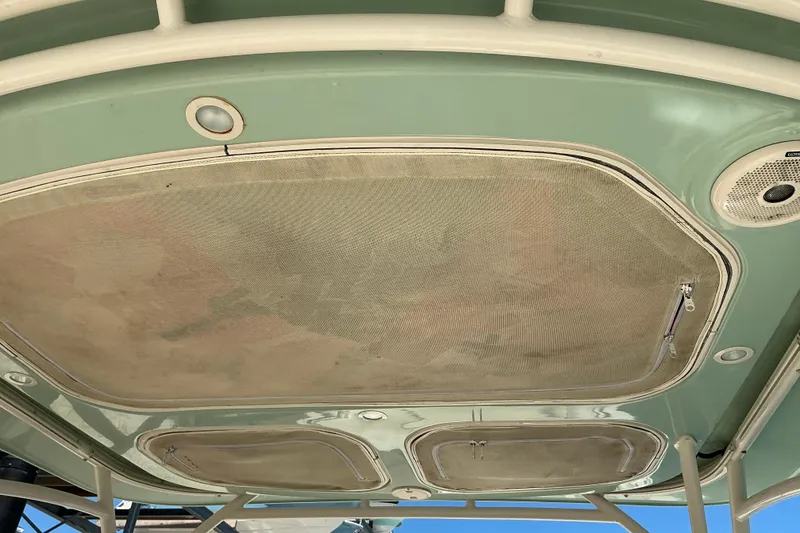 Slide: The Image of 2018 Grady-White Freedom 285 boat roof with speakers and hatches. - 25