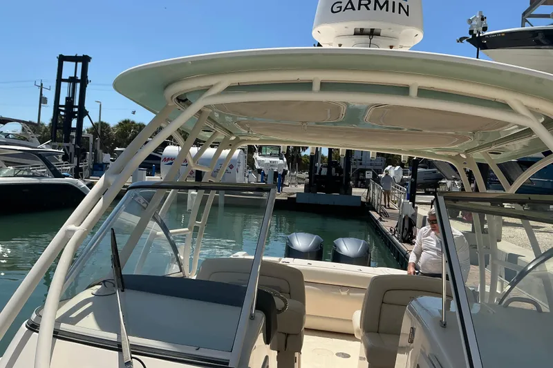 Slide: The Image of 2018 Grady-White Freedom 285 boat docked with Garmin equipment visible. - 6