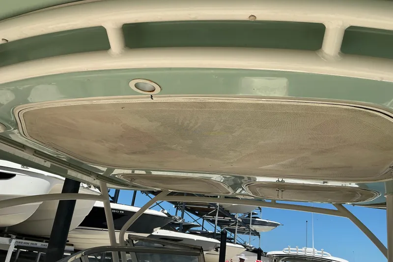 Slide: The Image of 2018 Grady-White Freedom 285 boat canopy with overhead storage compartments. - 9