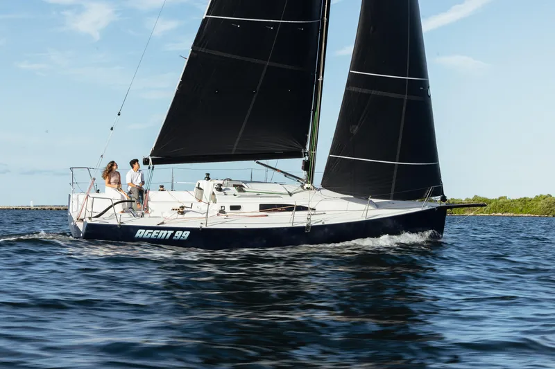 Slide: The Image of 2026 J Boats J/99 sailboat cruising on the water. - 3