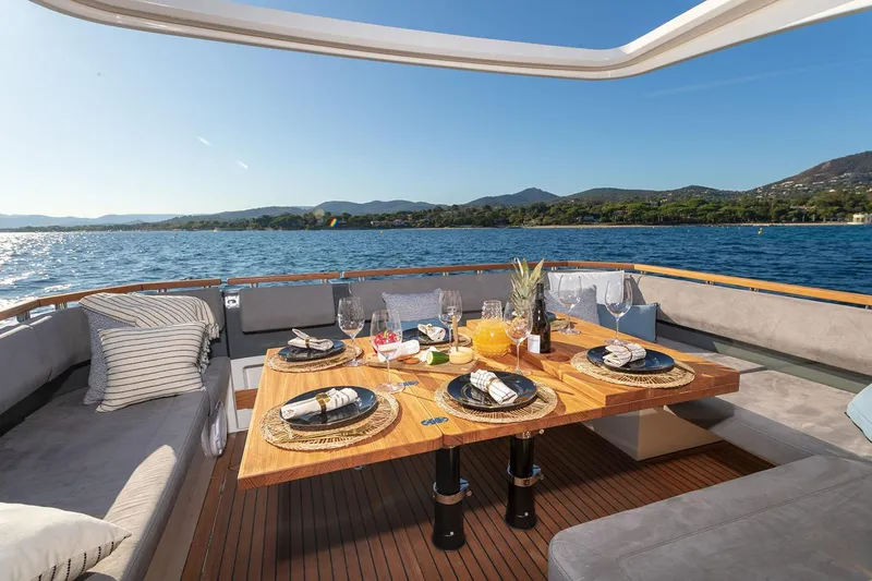 Slide: The Image of Manufacturer Provided Image: Marex 440 Gourmet Cruiser 2026, luxury dining table on yacht deck. - 5