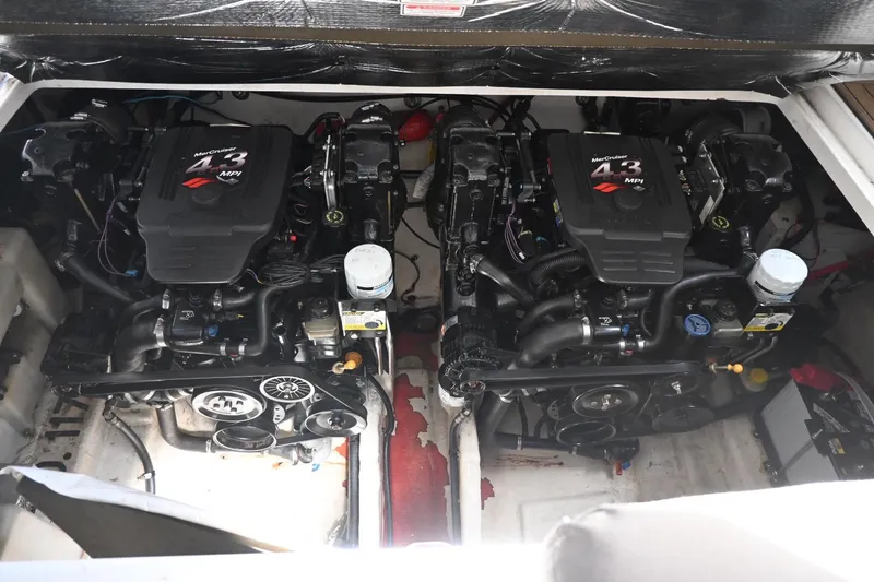 Slide: The Image of Twin MerCruiser 4.3 MPI engines in a 2005 Sea Ray Sundancer 280 boat. - 32