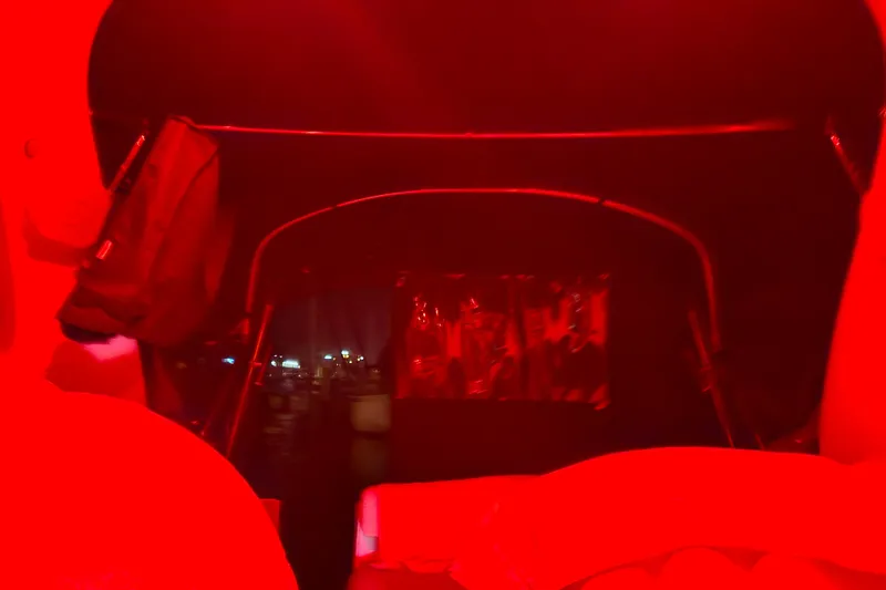Slide: The Image of 2005 Sea Ray Sundancer 280 interior illuminated by red light at night. - 41