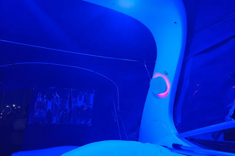 Slide: The Image of 2005 Sea Ray Sundancer 280 interior with blue ambient lighting. - 45