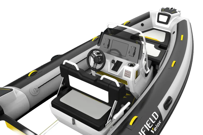 Slide: The Image of Manufacturer Provided Image: 2025 Highfield VELOX 560 inflatable boat, featuring modern console and seating design. - 4