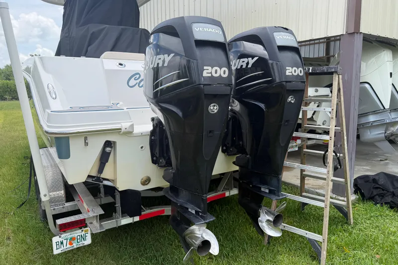 Slide: The Image of 2016 Boston Whaler 250 Outrage with twin Mercury Verado 200 engines on trailer. - 14