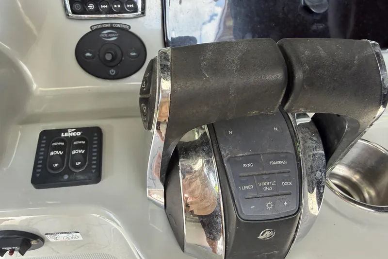 Slide: The Image of Close-up of 2016 Boston Whaler 250 Outrage boat controls and throttle system. - 20