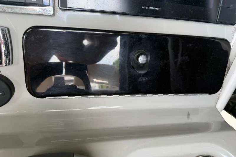 Slide: The Image of Control panel of a 2016 Boston Whaler 250 Outrage boat. - 23