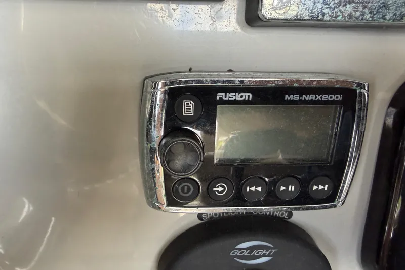 Slide: The Image of Fusion MS-NRX200i marine stereo on 2016 Boston Whaler 250 Outrage dashboard. - 24