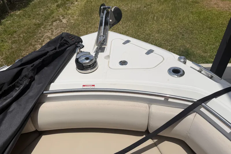 Slide: The Image of Bow of 2016 Boston Whaler 250 Outrage with anchor and seating area. - 40