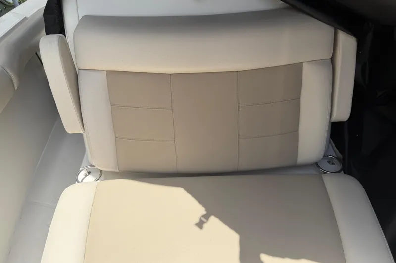 Slide: The Image of 2016 Boston Whaler 250 Outrage boat seat, beige upholstery, comfortable design. - 41