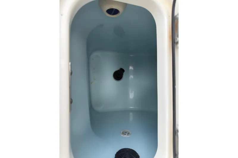 Slide: The Image of Interior view of a 2016 Boston Whaler 250 Outrage livewell. - 47
