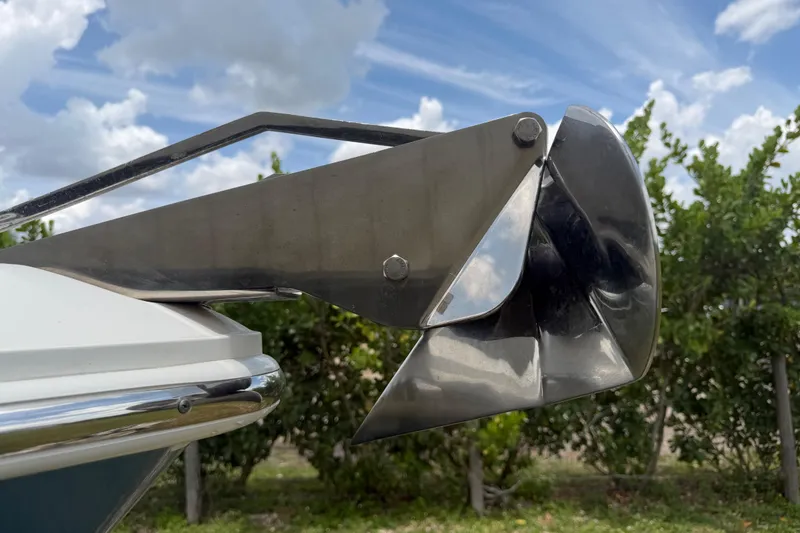 Slide: The Image of Close-up of 2016 Boston Whaler 250 Outrage anchor against a cloudy sky background. - 7