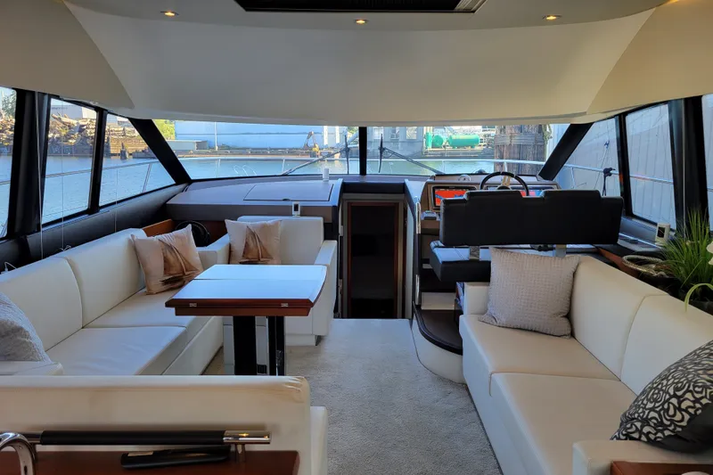 Slide: The Image of Luxurious interior of a 2017 Prestige 500 yacht with elegant seating and modern design. - 49