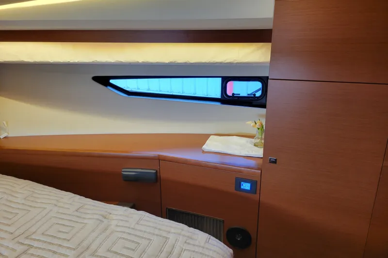 Slide: The Image of Interior cabin of a 2017 Prestige 500 yacht with modern wood finish. - 30
