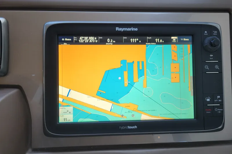 Slide: The Image of Raymarine navigation display on a 2017 Prestige 500 yacht, showing nautical chart details. - 19