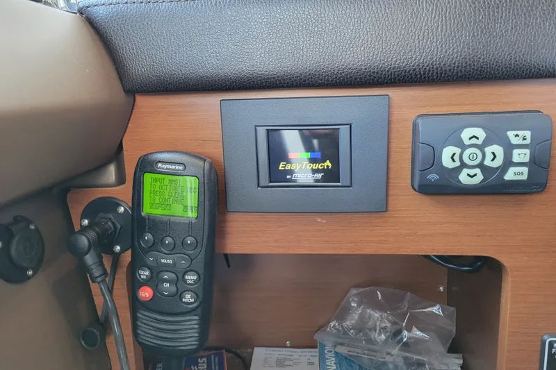 Slide: The Image of Control panel of a 2017 Prestige 500 yacht featuring EasyTouch and Raymarine devices. - 27