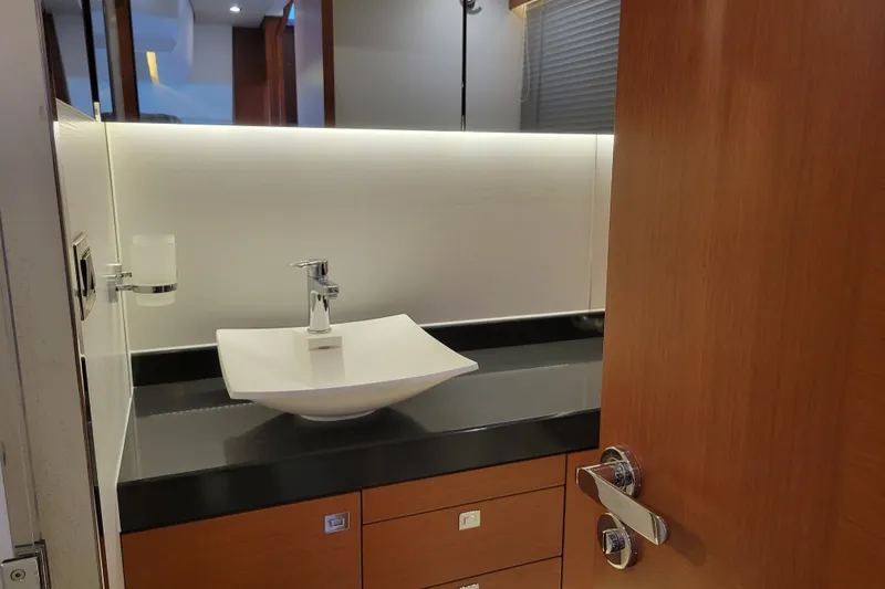 Slide: The Image of Luxurious bathroom interior of 2017 Prestige 500 yacht with modern sink and elegant design. - 39