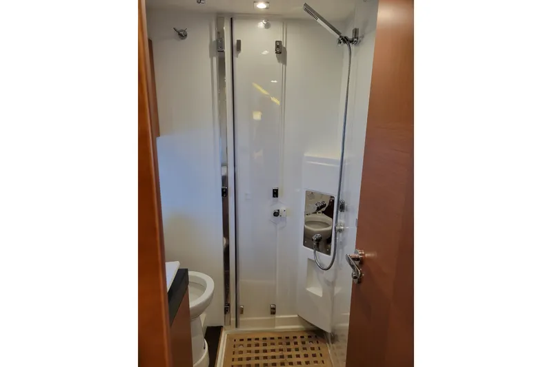 Slide: The Image of Bathroom interior of a 2017 Prestige 500 yacht, featuring a modern shower and fixtures. - 33