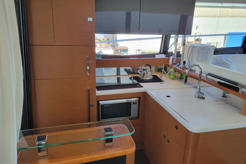 Slide: The Image of Modern kitchen interior of 2017 Prestige 500 yacht with sleek cabinetry and appliances. - 11