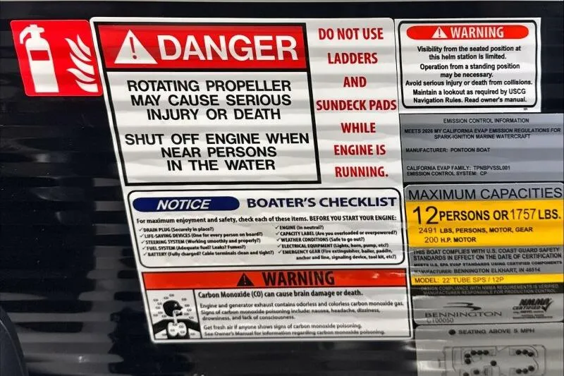 Slide: The Image of Safety warnings and capacity details on a 2026 Bennington 23 SX L-Bench boat. - 12