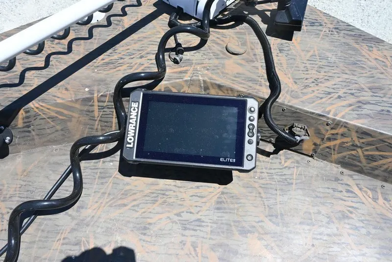 Slide: The Image of Lowrance Elite fish finder on 2025 G3 Gator Tough 20 CC boat deck. - 10