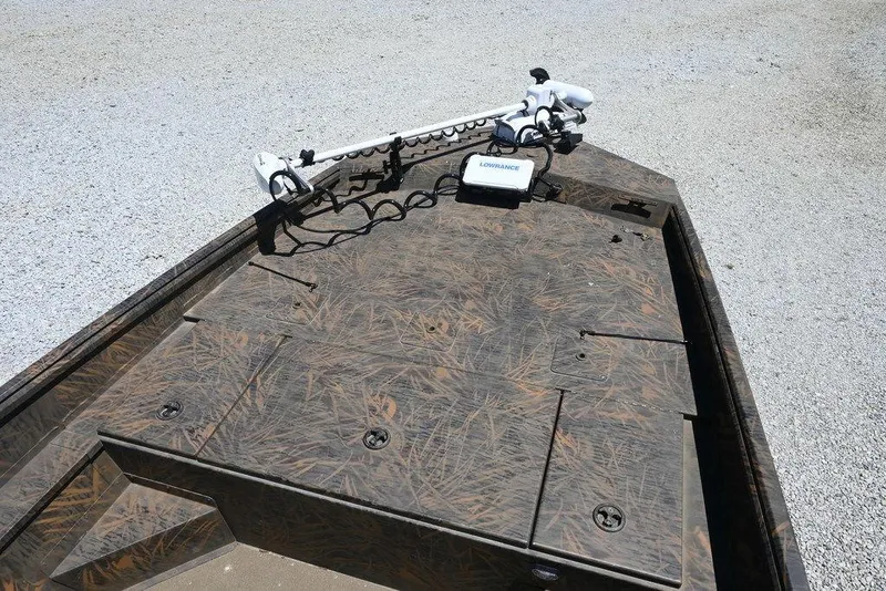 Slide: The Image of 2025 G3 Gator Tough 20 CC boat with camo deck and trolling motor. - 5