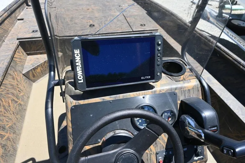 Slide: The Image of 2025 G3 Gator Tough 20 CC boat dashboard with Lowrance Elite fishfinder. - 7