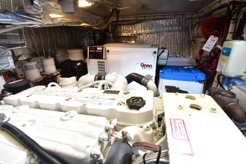 Slide: The Image of Engine room of a 2007 Nordic Tug 37 with Onan Marine Generator. - 24
