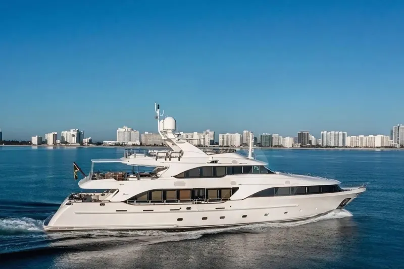 The Image of Luxury 2008 Benetti Classic yacht cruising near city skyline on a clear day. - 1