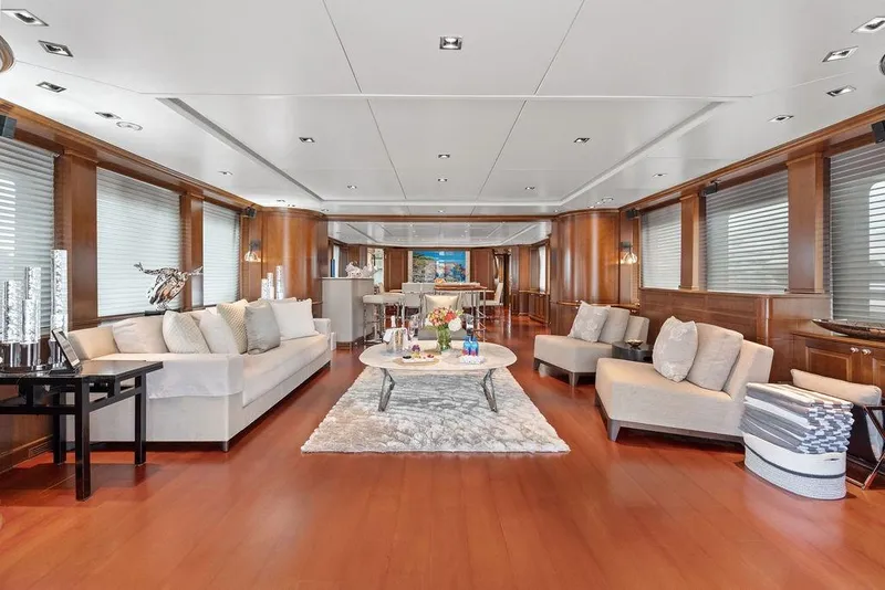 Slide: The Image of Luxurious interior of a 2008 Benetti Classic yacht with elegant furnishings and wooden accents. - 21