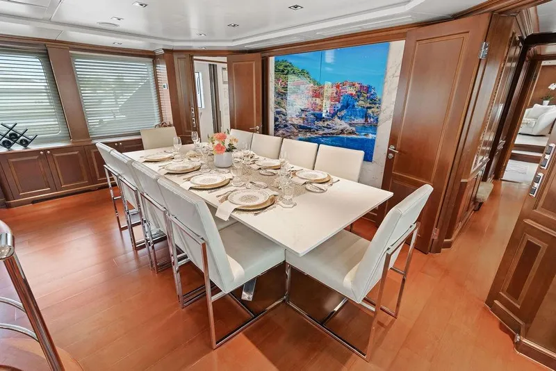 Slide: The Image of Luxurious dining area on 2008 Benetti Classic yacht with elegant table setting. - 27