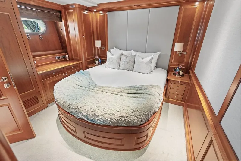 Slide: The Image of Luxurious 2008 Benetti Classic yacht bedroom with elegant wood paneling and plush bedding. - 33