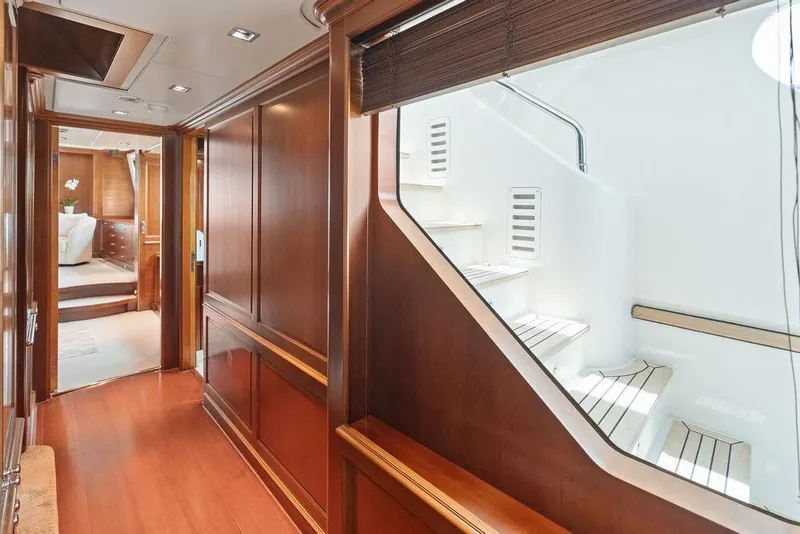 Slide: The Image of Luxurious interior of 2008 Benetti Classic yacht with elegant wood paneling and staircase. - 41