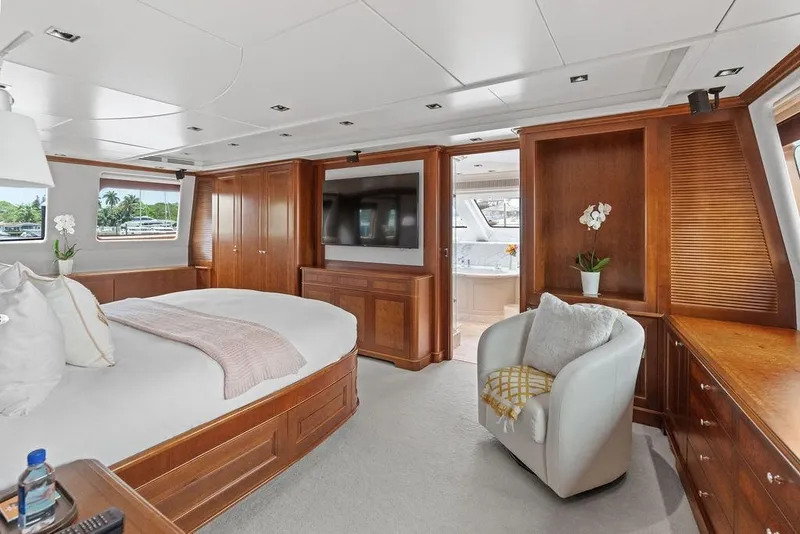 Slide: The Image of Luxurious 2008 Benetti Classic yacht bedroom with elegant wood finishes and modern amenities. - 44