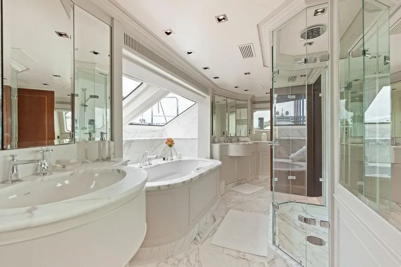 Slide: The Image of Luxurious bathroom on a 2008 Benetti Classic yacht, featuring marble finishes and modern fixtures. - 48
