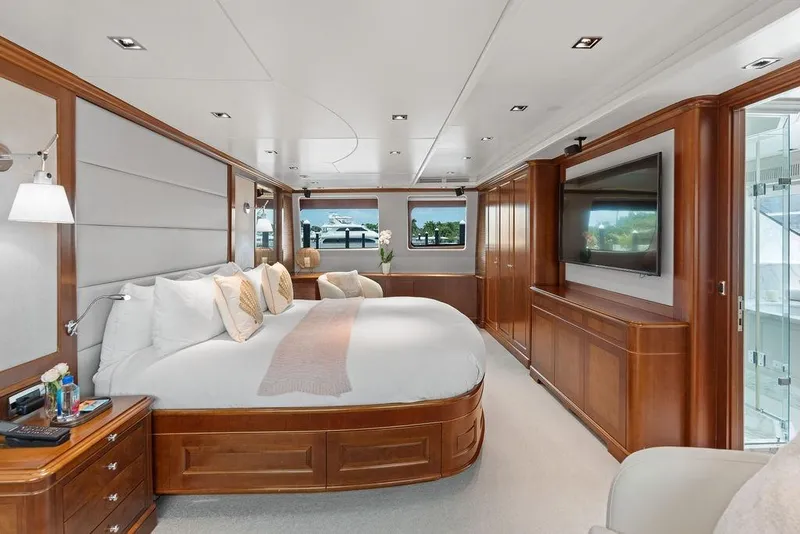 Slide: The Image of Luxurious 2008 Benetti Classic yacht bedroom with elegant wood finishes and modern amenities. - 52